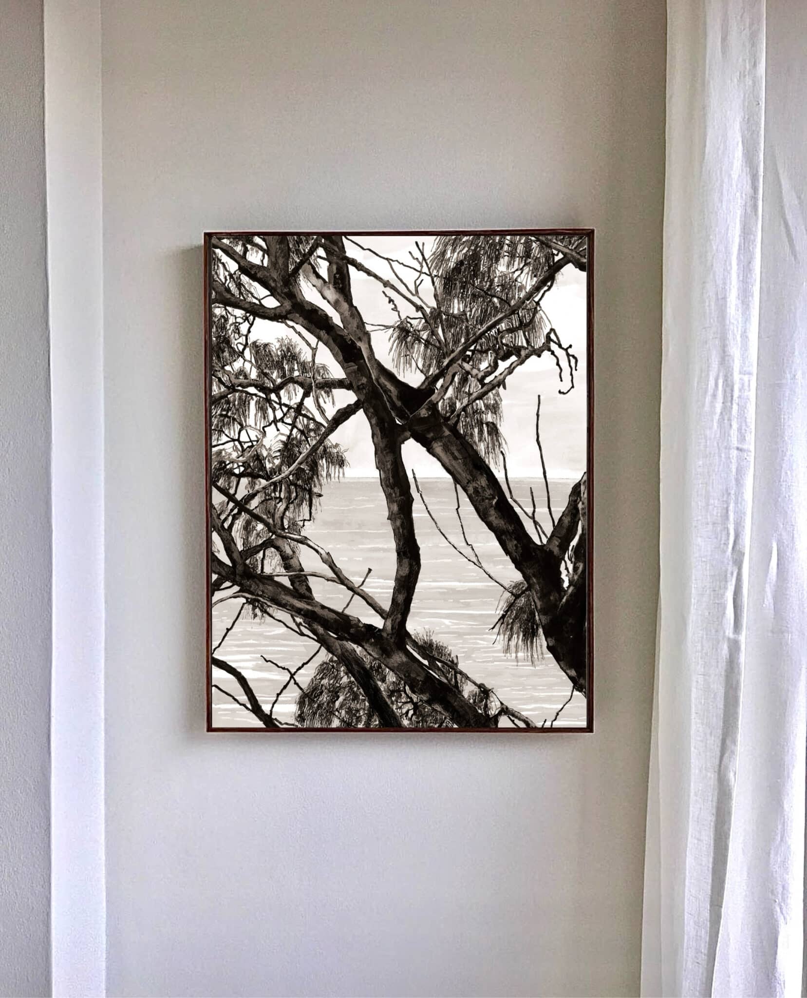 A realistic trees painting with detailed foliage hanging in a modern living room